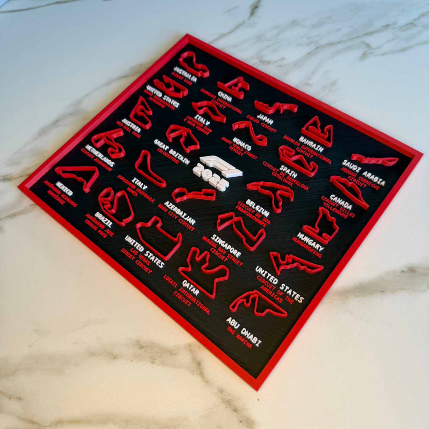 F1 Callender with country and circuit patterns